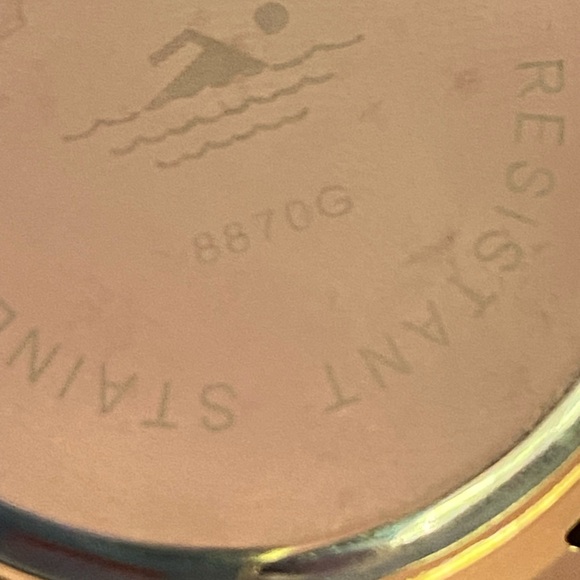 Ladies fashion gold tone watch with quartz face, and a cream faux leather band. - Picture 5 of 11